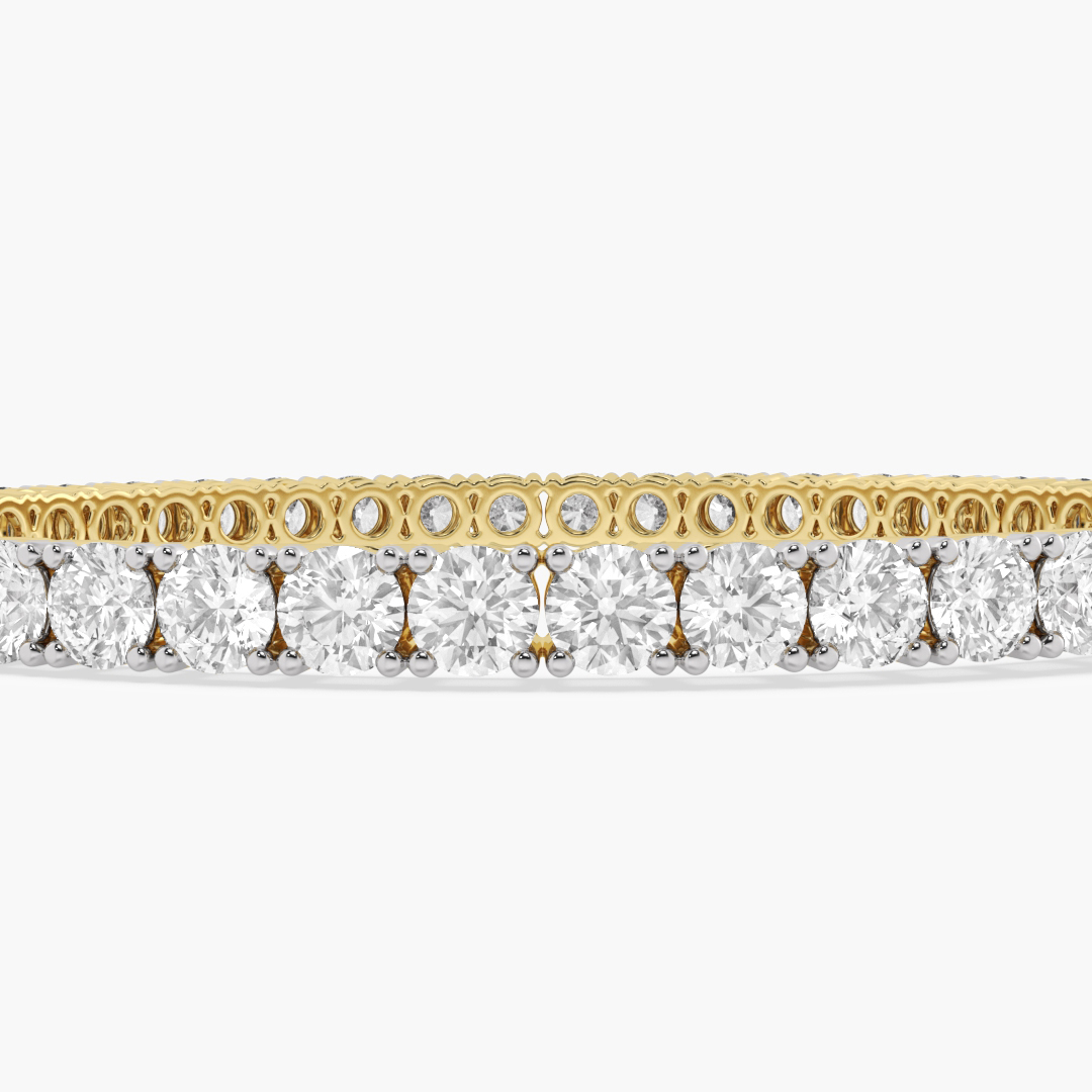 9.71 carat lab grown diamond bangle in 14KT yellow gold, worn on model