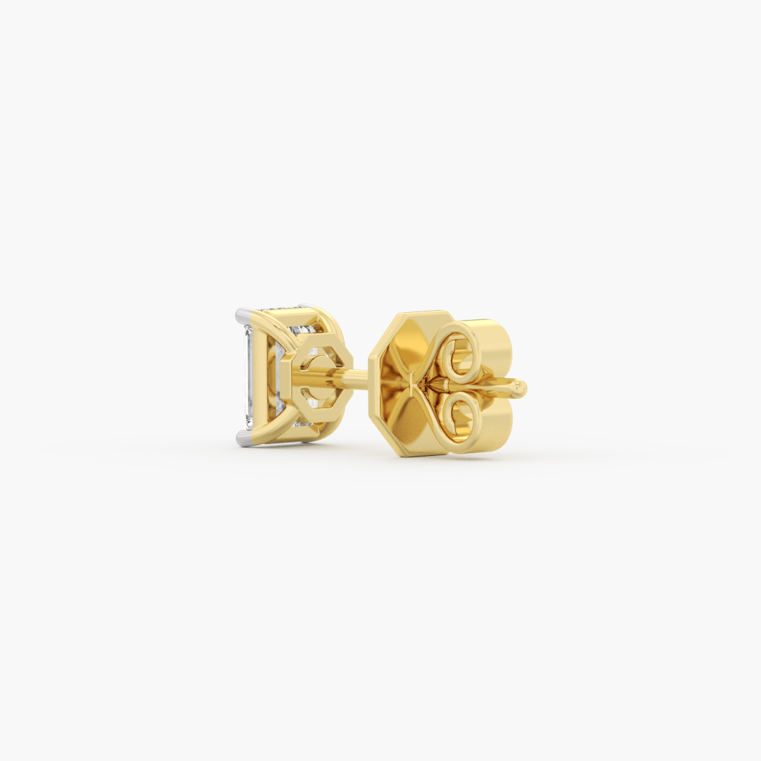 1.04 carat lab grown diamond solitaire stud earrings in 14KT yellow gold, worn on model