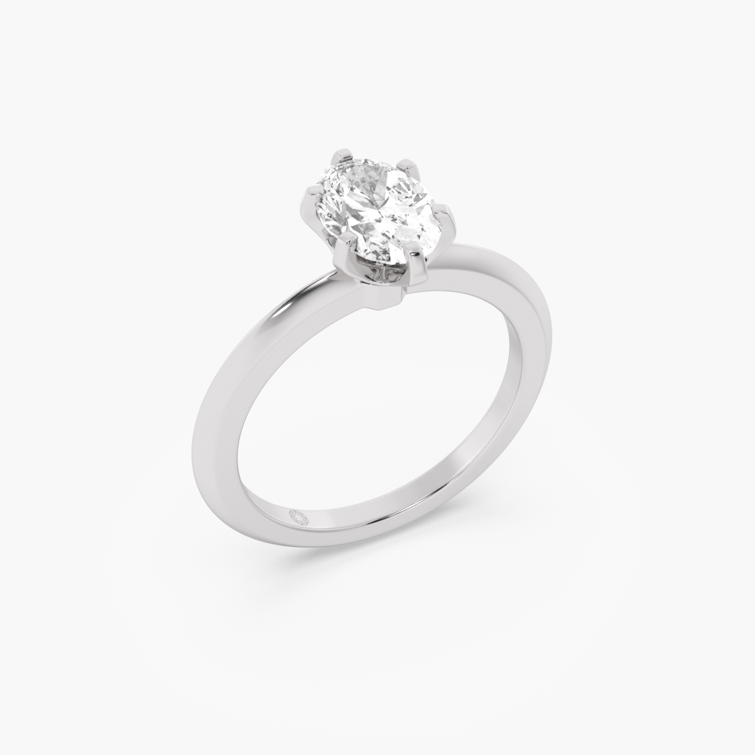1.05 carat lab grown diamond solitaire ring in 18KT white gold, worn on model