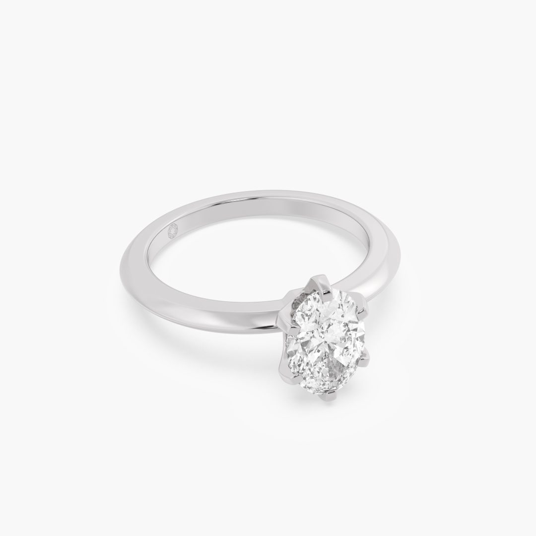 1.05 carat lab grown diamond solitaire ring in 18KT white gold, shown with a scale reference