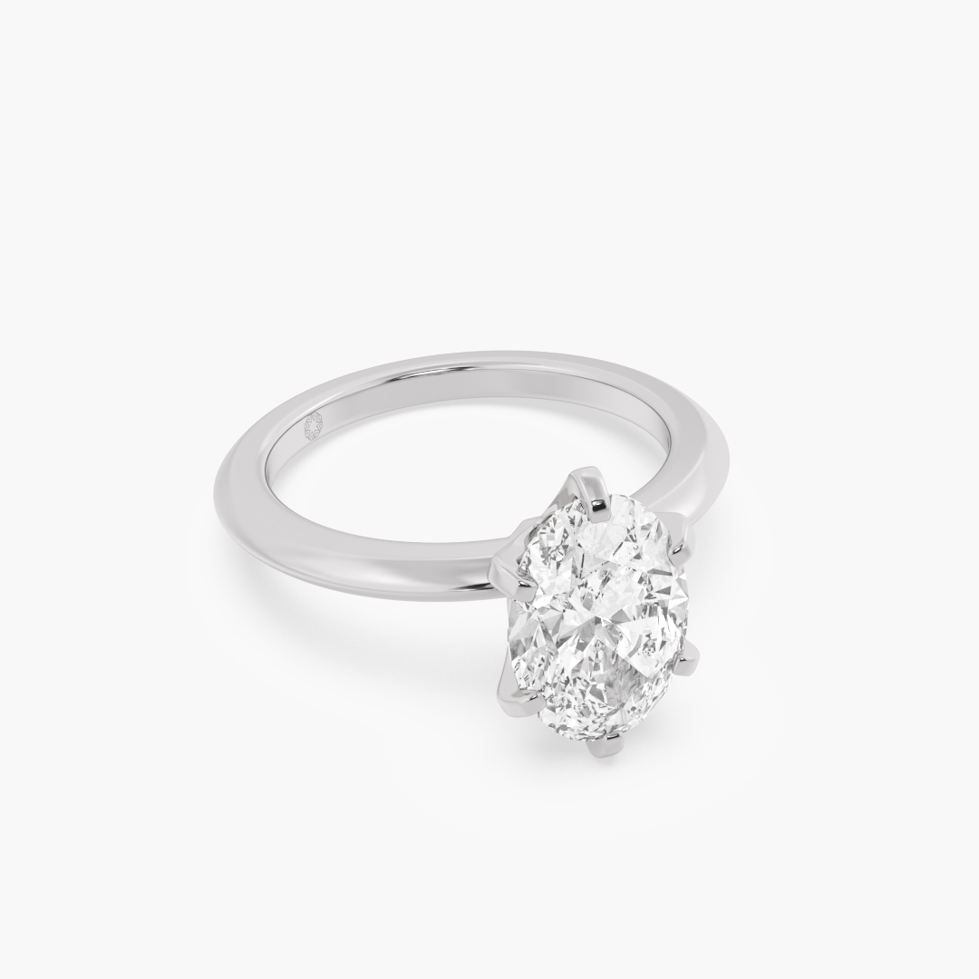 2.08 carat lab grown diamond solitaire ring in 18KT white gold, shown with a scale reference