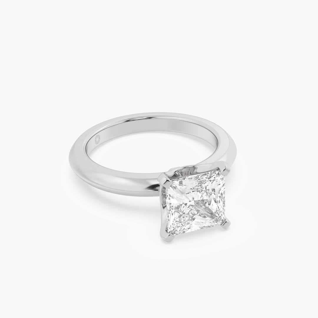 2.05 carat lab grown diamond solitaire ring in 18KT white gold, shown with a scale reference