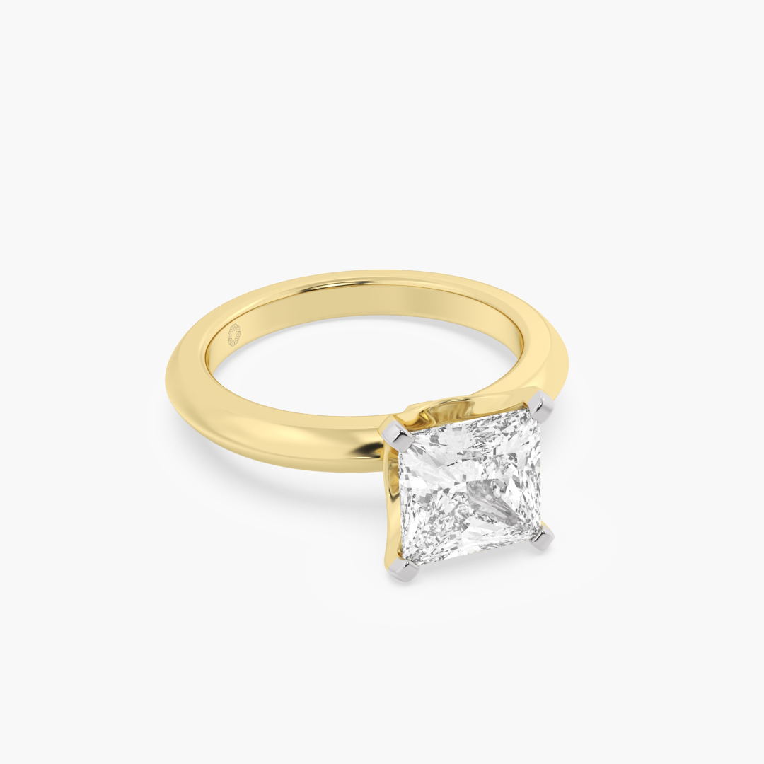 2.09 carat lab grown diamond solitaire ring in 18KT yellow gold, shown with a scale reference